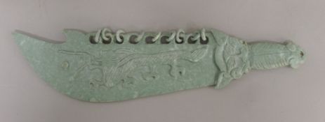 A Chinese stone ceremonial sword. 50.5 cm long.