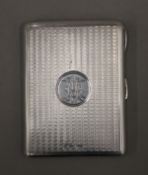 A silver card case. 10 cm wide. 109 grammes total weight.