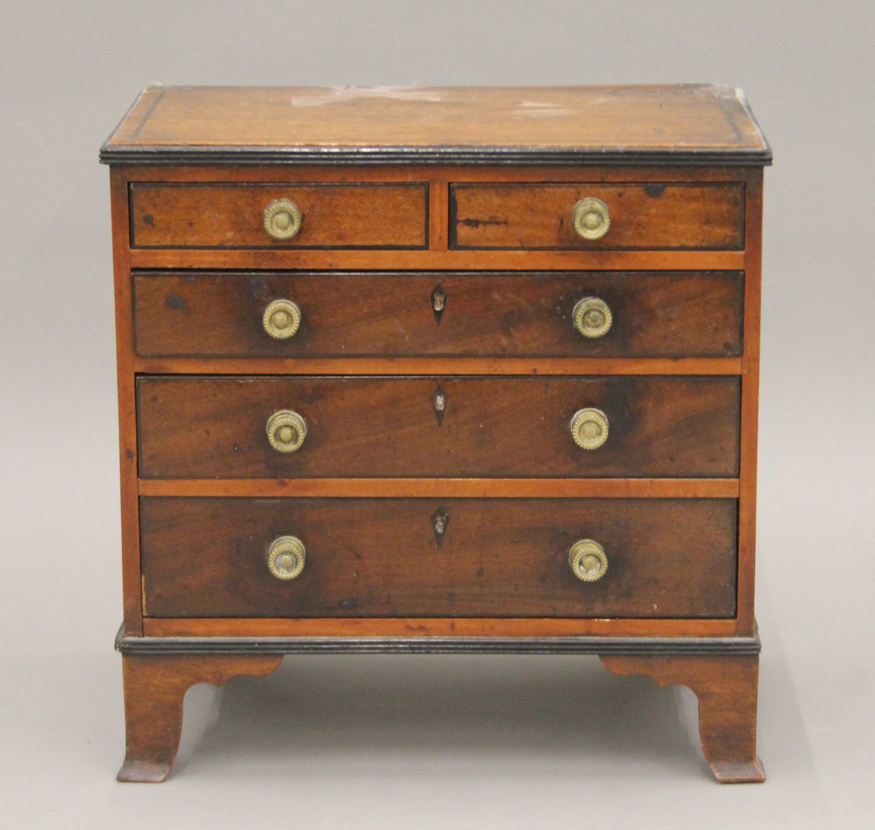 A 19th century mahogany miniature chest of drawers. 36.5 cm wide.