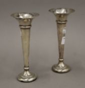 A pair of silver bud vases. 16 cm high.