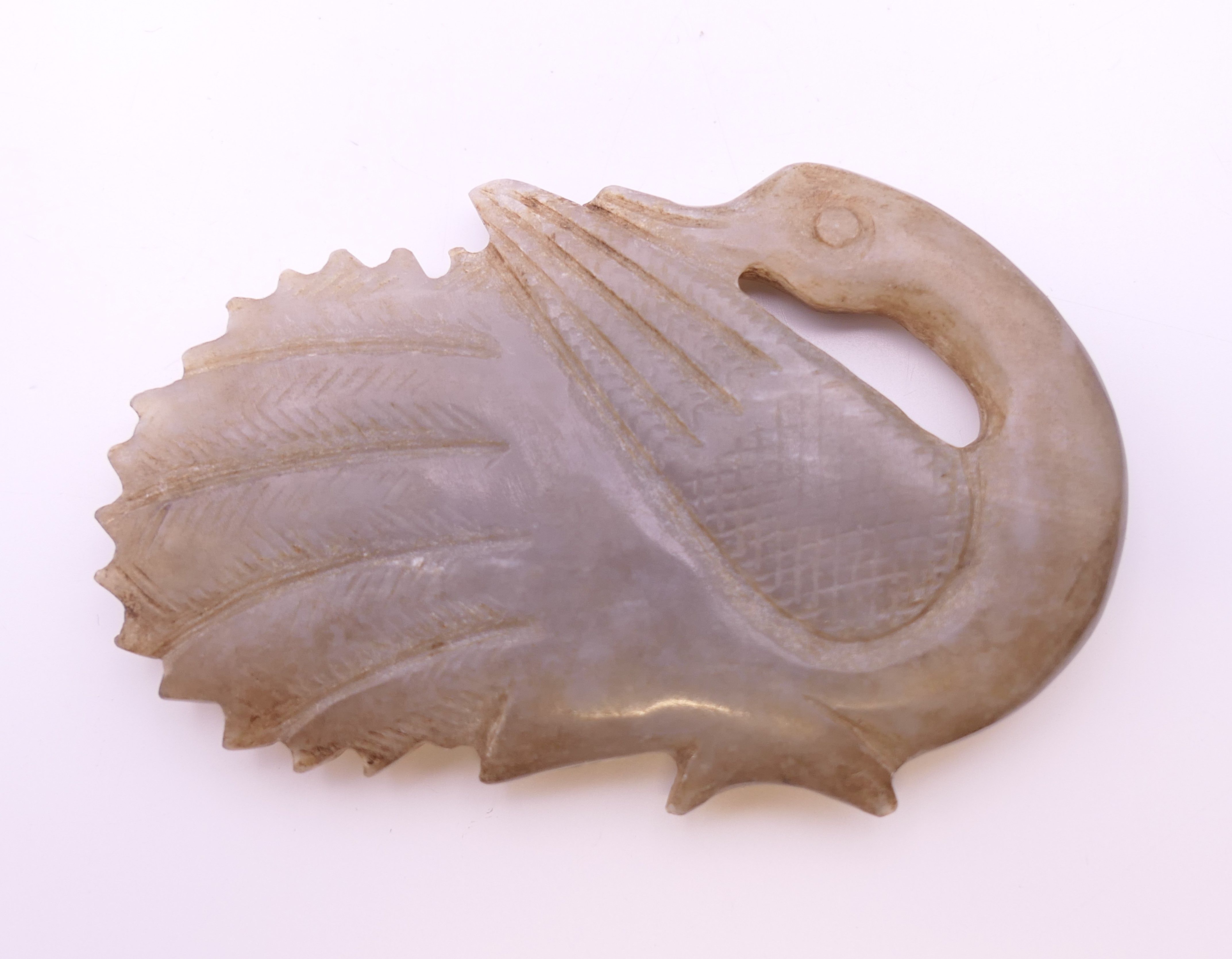 A Chinese light grey jade goose, Qing Dynasty. 5.5 cm long. - Image 2 of 5