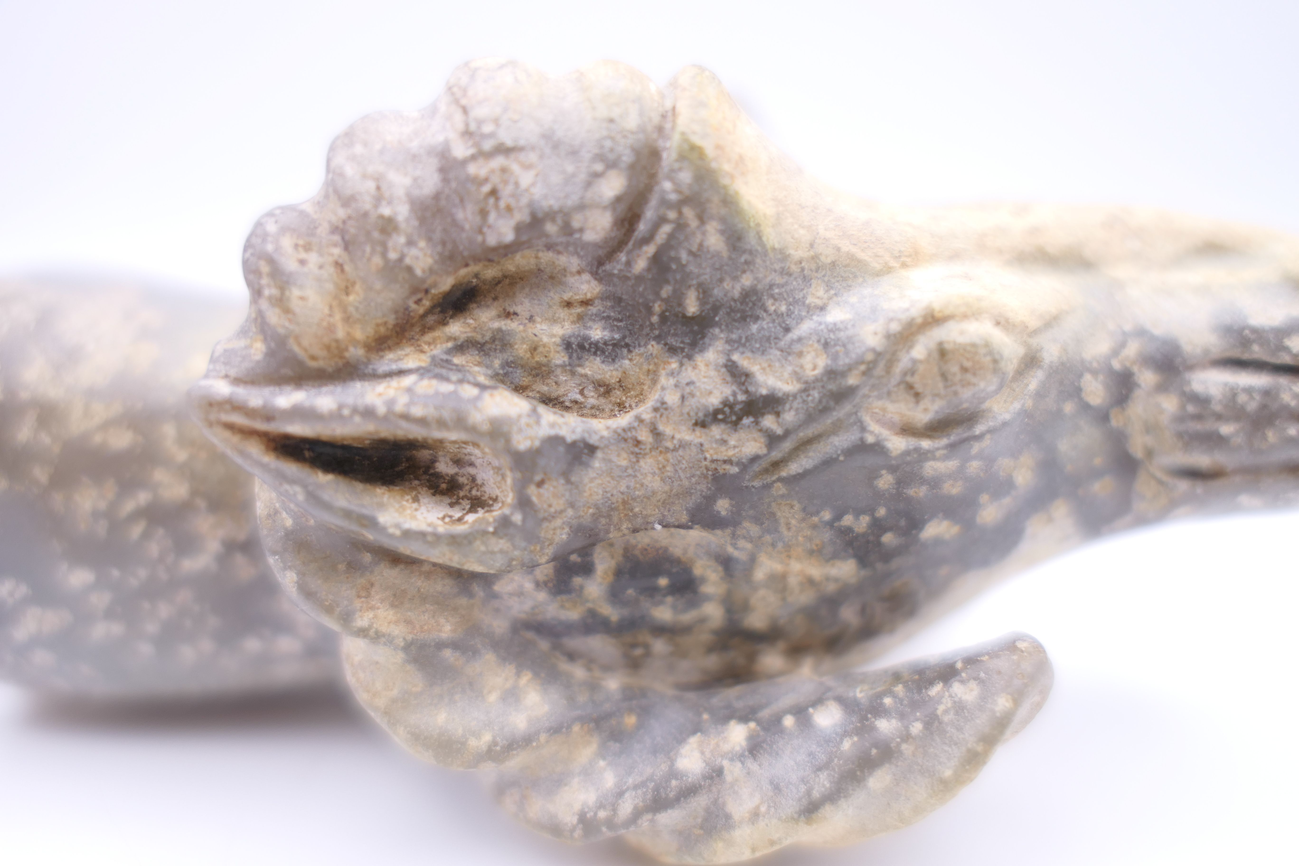 A Chinese white and grey jade rams head, Han Dynasty. 9.5 cm long. - Image 7 of 7