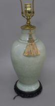 A Chinese celadon crackle glaze vase mounted as a lamp. 71 cm high.