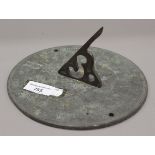 A brass sundial plate. 19 cm diameter.