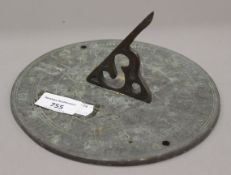 A brass sundial plate. 19 cm diameter.