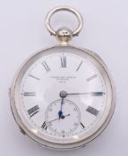 A Charles Young silver open face pocket watch, hallmarked for 1893. 5 cm diameter.