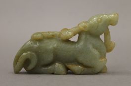 A jade dog-of-fo. 8.5 cm long.