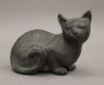 A bronze model of a cat. 17 cm long.