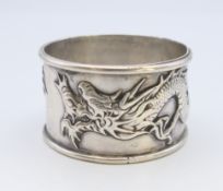 A Chinese silver napkin ring. 4.5 cm diameter. 39.5 cm grammes.