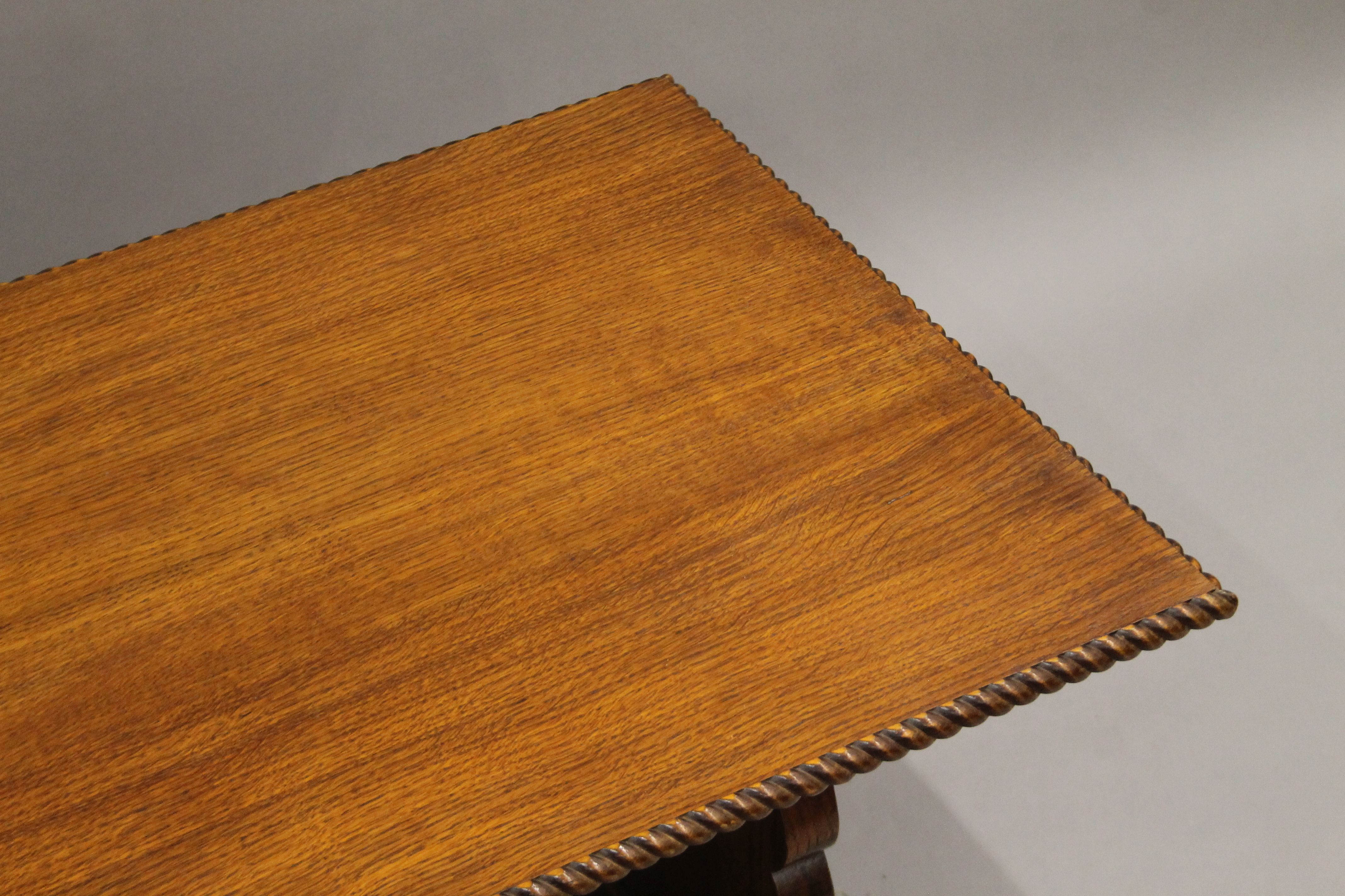 An early 20th century oak coffee table. 109 cm long. - Image 2 of 4