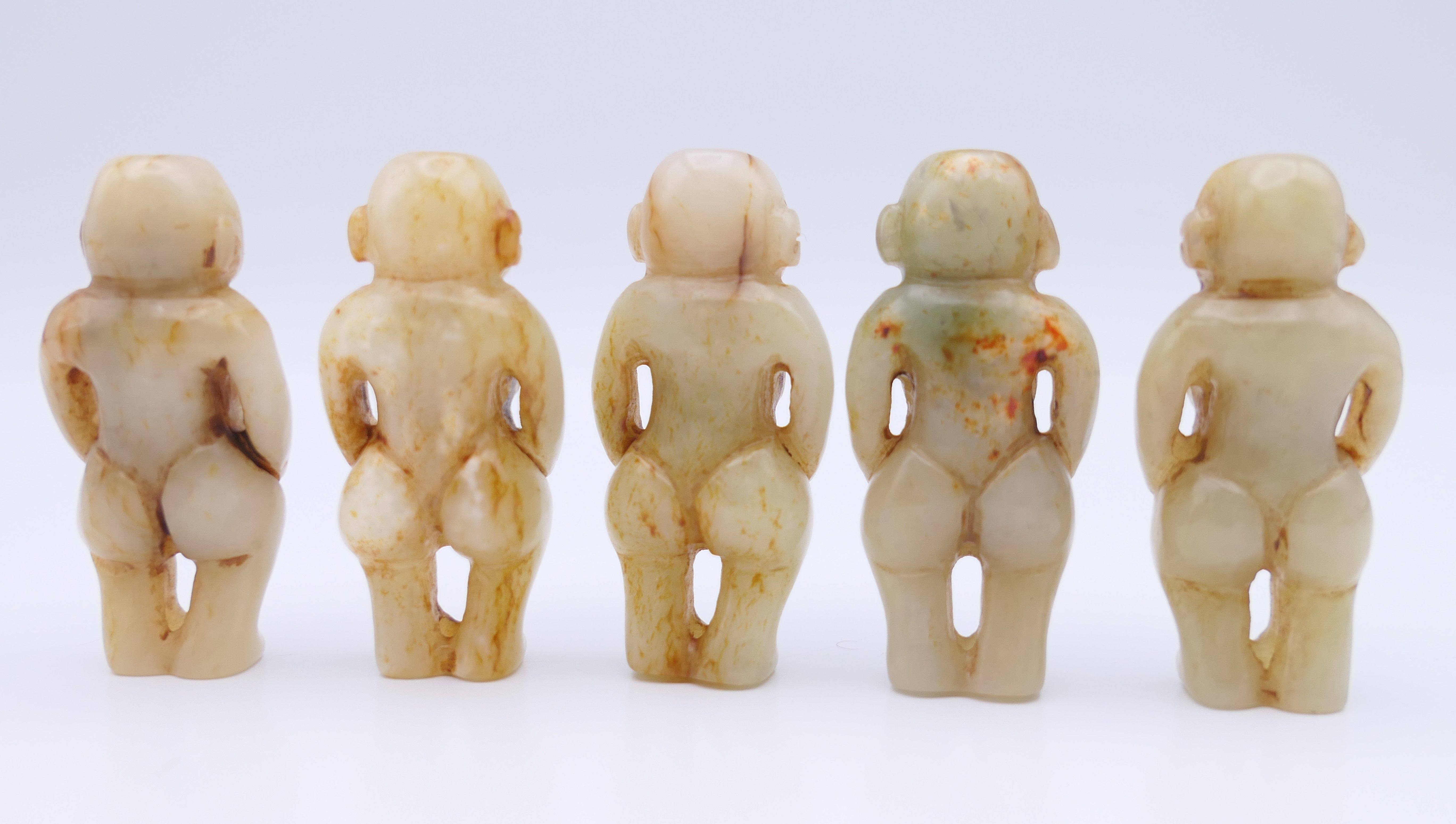Nine Chinese fertility beads (seven male and two female), Han Dynasty. Each approximately 4 cm high. - Image 5 of 17