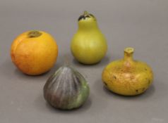 Four fruit form glass paperweights by Gozo. The largest 7.5 cm high.