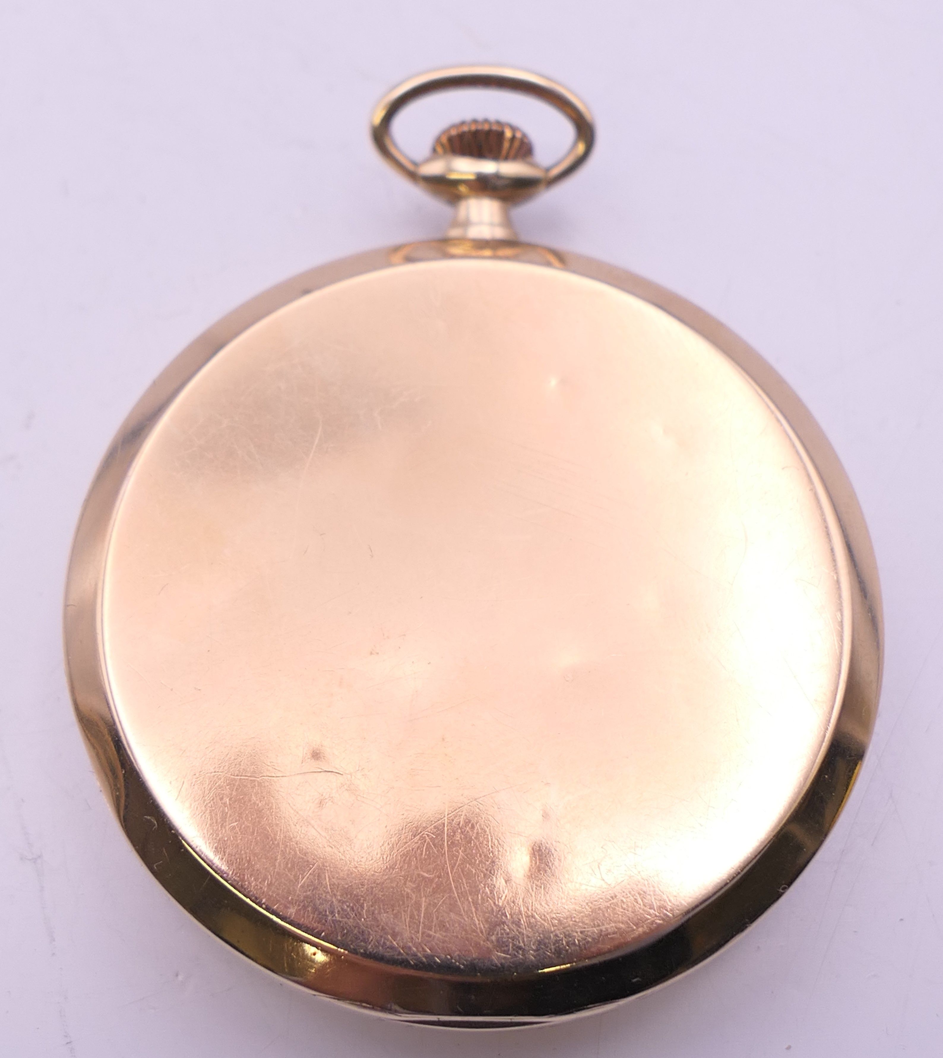 A 9 ct gold cased Dennison pocket watch, hallmarked for Birmingham 1951. 4.5 cm diameter. 49. - Image 4 of 7