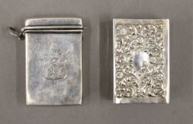 A chatelaine silver matchbox holder and a silver matchbox holder. The former 4.25 cm high.