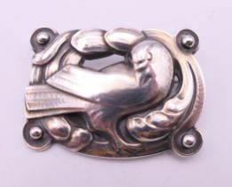 A vintage Georg Jensen rectangular silver brooch with dove design, numbered 209. 4.25 cm wide.