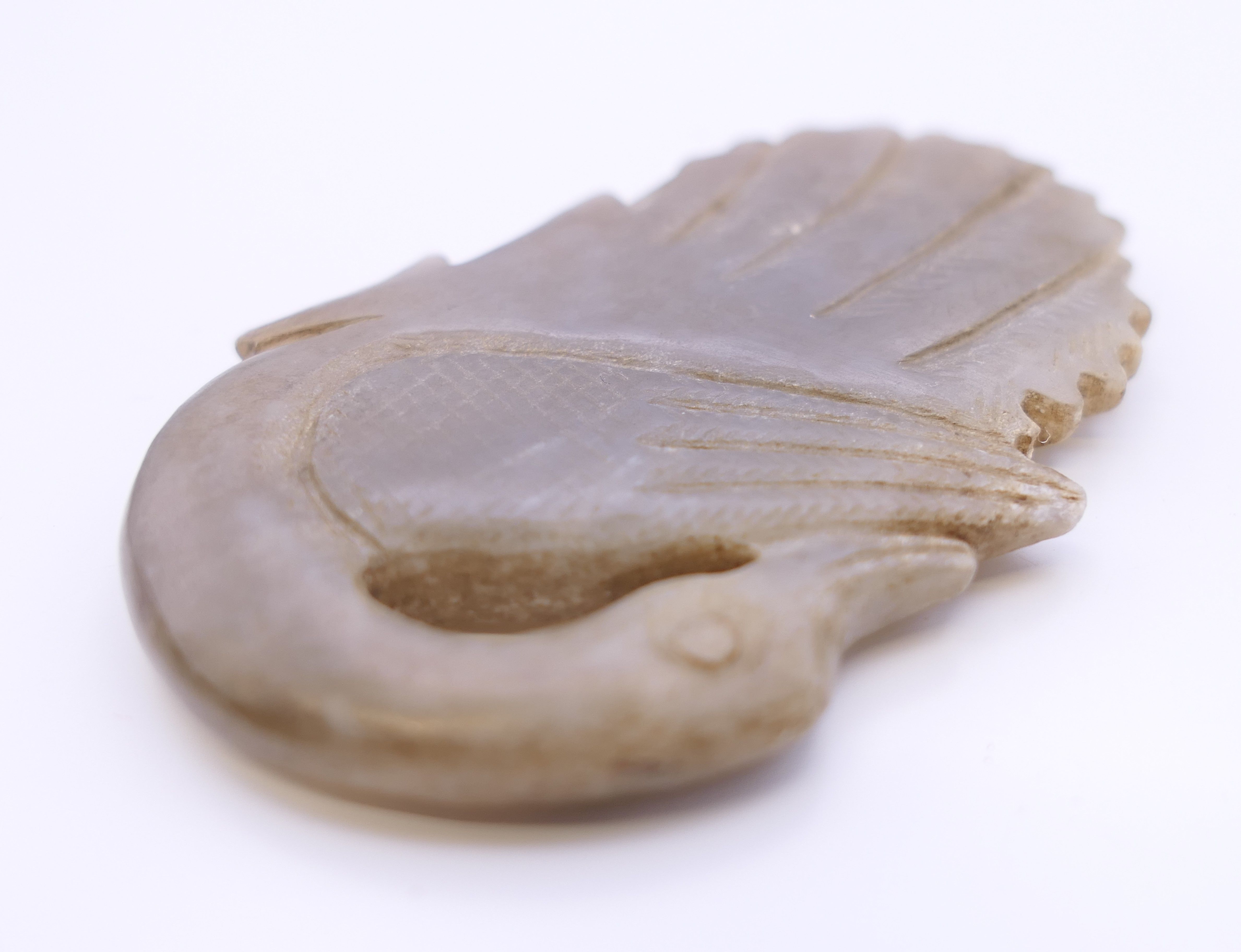 A Chinese light grey jade goose, Qing Dynasty. 5.5 cm long. - Image 4 of 5