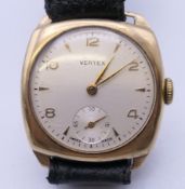 A vintage 9 ct gold Vertex gentleman's wristwatch. 3 cm wide. 32.6 grammes total weight.