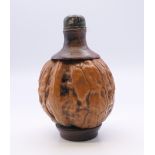 A Chinese walnut snuff bottle. 5.5 cm high. Provenance: The Larkin/Minney Collection.