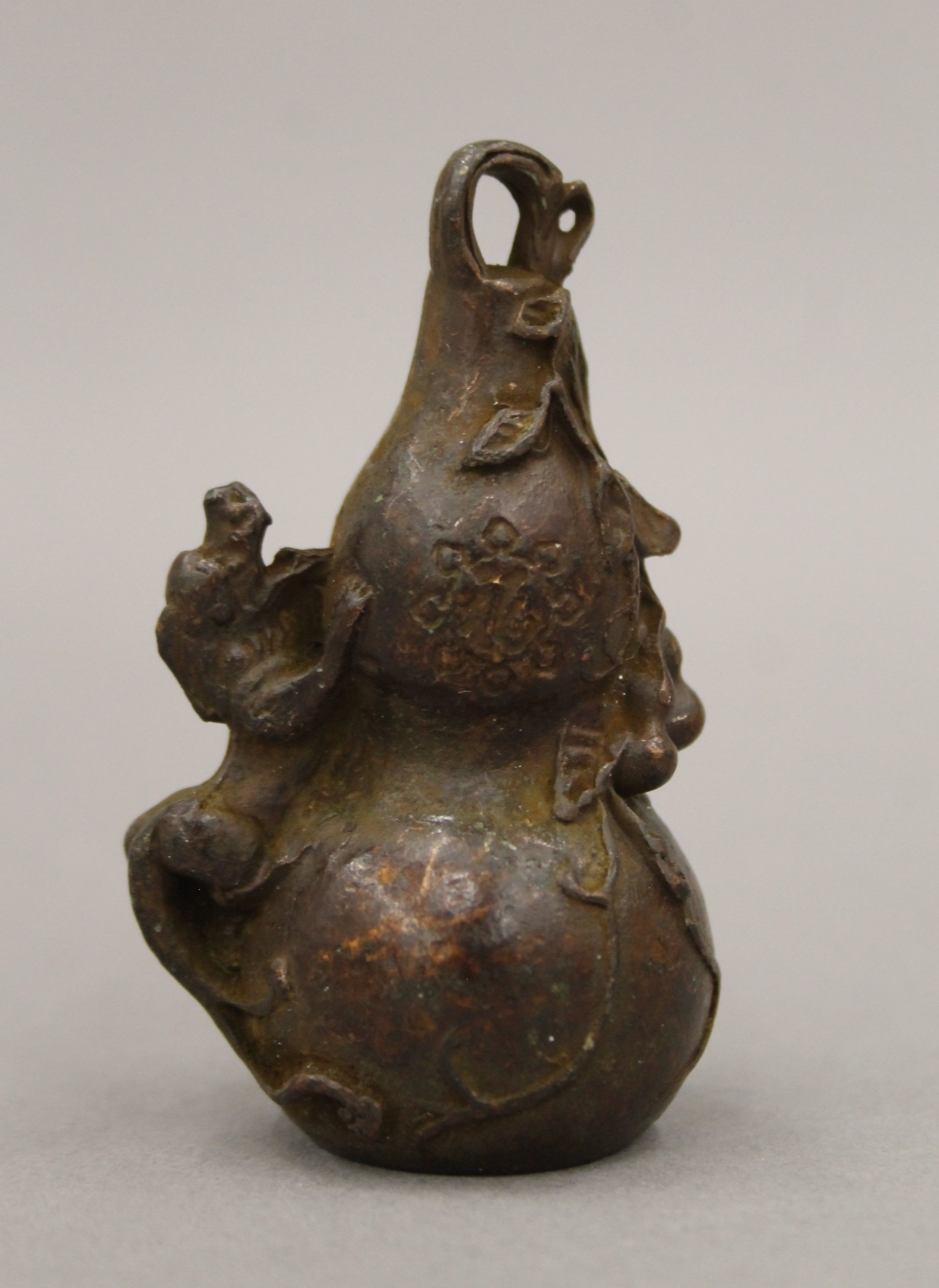 A bronze double gourd. 7 cm high. - Image 2 of 5