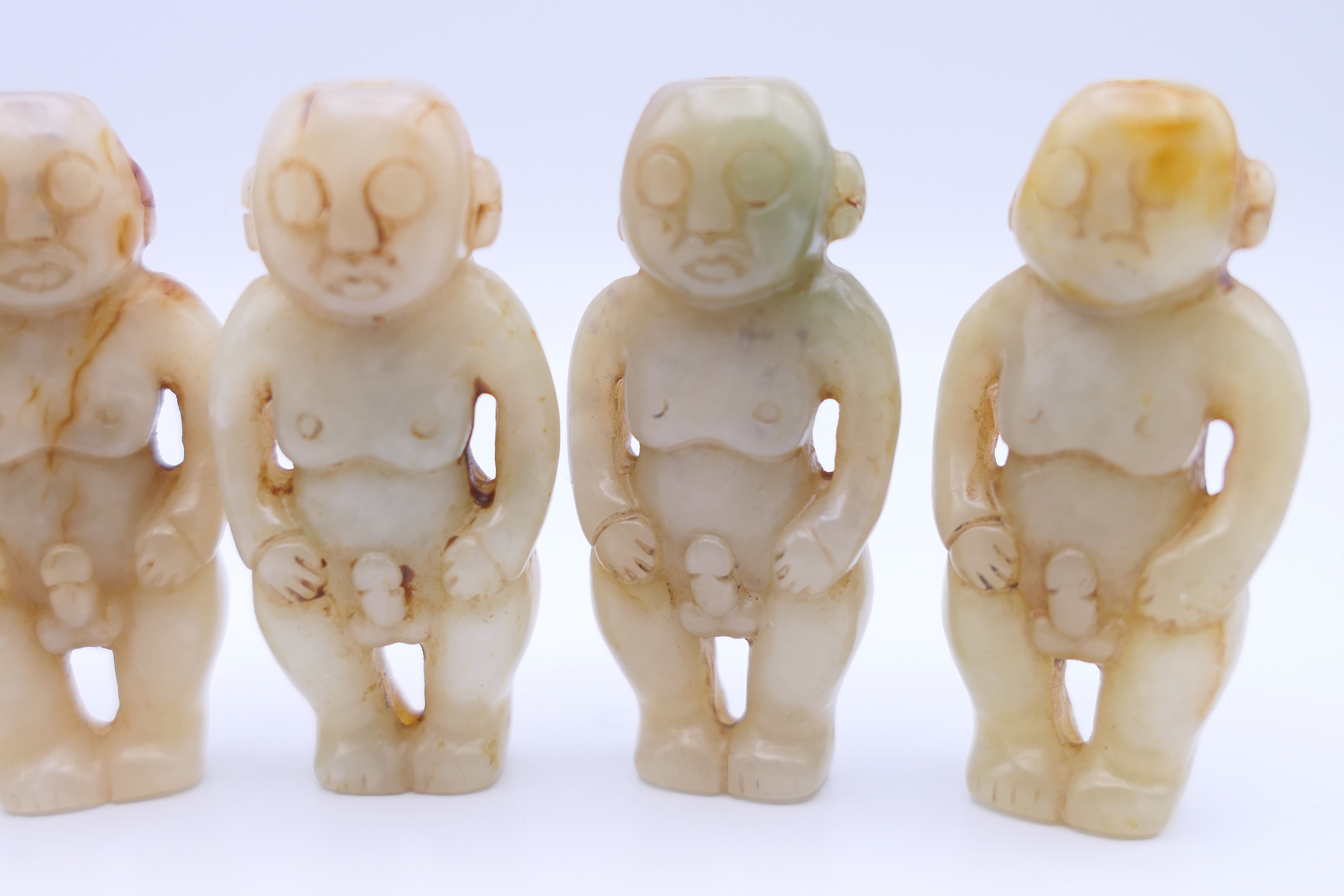 Nine Chinese fertility beads (seven male and two female), Han Dynasty. Each approximately 4 cm high. - Image 4 of 17