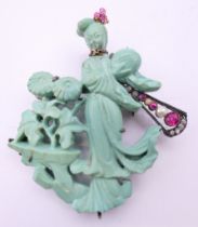 A Chinese turquoise gem set brooch. 6.5 cm high.