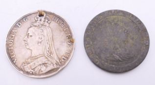 An 1891 silver coin and a 1797 coin. The former 3.75 cm diameter.