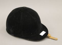 A Just Togs riding hat.