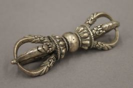 A Tibetan ceremonial vajra. 9 cm long.