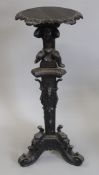 A 19th century carved jardiniere stand. 106 cm high.