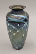 An Okra iridescent cut glass vase. 20.5 cm high.