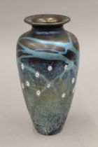 An Okra iridescent cut glass vase. 20.5 cm high.