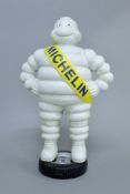 A cast iron Michelin Man. 39 cm high.