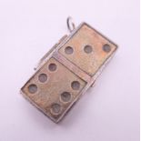 A silver box formed as a domino. 4.5 cm long. 15.3 grammes.