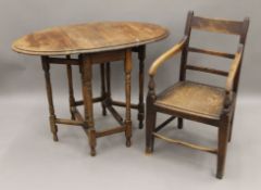 A small oak gate leg table and a 19th century Country chair. The former 59 cm long.