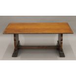 An early 20th century oak coffee table. 109 cm long.