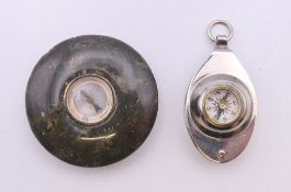 An agate compass and a compass magnifying fob. The former 4.25 cm diameter.