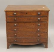 A Victorian miniature mahogany chest of drawers. 47 cm wide.