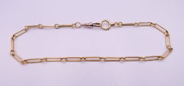 A 15 ct gold watch chain with 9 ct gold clasp. 38 cm long. 23.6 grammes.
