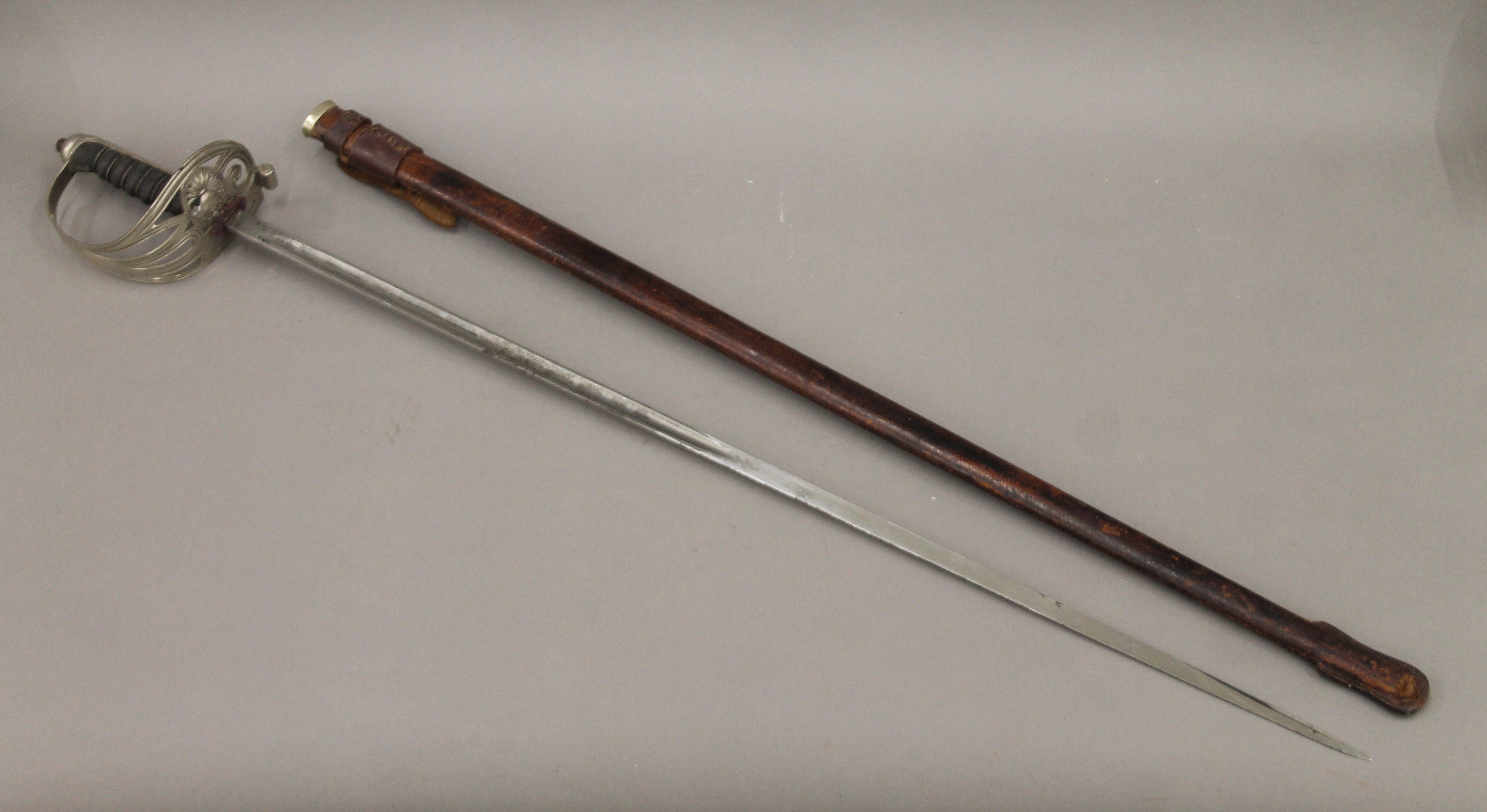 A George V Service sword in scabbard. 99 cm long. - Image 3 of 9