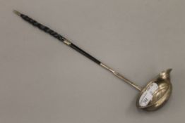 A Georgian baleen handled silver toddy ladle. 40 cm long.