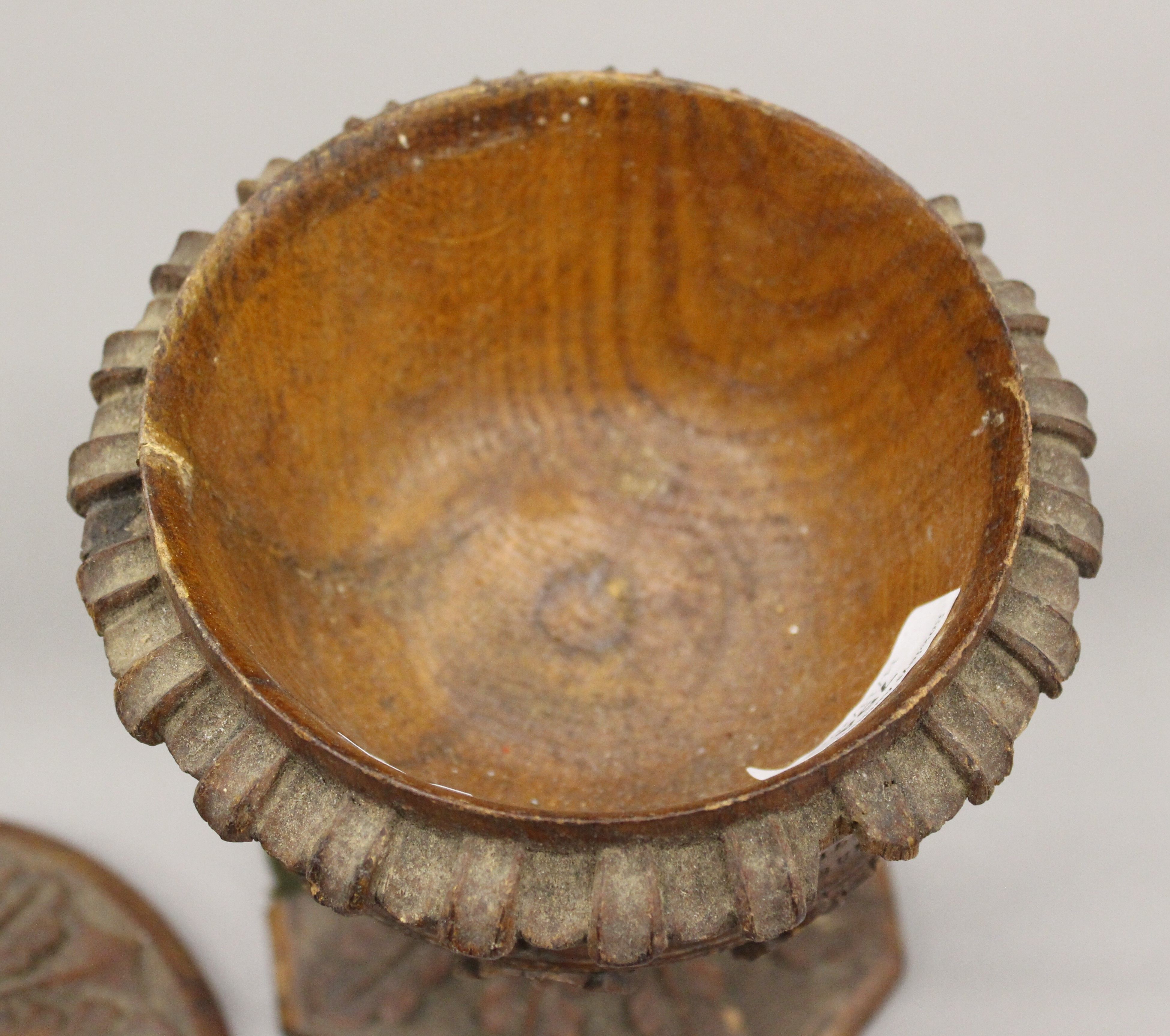A carved oak cup and cover. 24 cm high. - Image 5 of 7