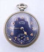 An Ingersol Eclipse pocket watch, numbered 49274489. 4.5 cm diameter.