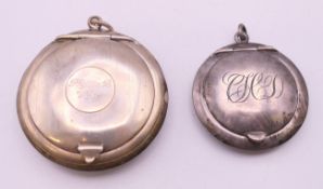 Two small silver compacts. The largest 5 cm diameter. 37.2 grammes total weight.