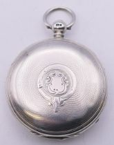 A silver full hunter pocket watch, hallmarked for London 1881. 5 cm diameter.