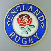 A cast iron England Rugby sign. 23.5 cm diameter.