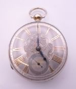 An open face silver pocket watch, hallmarked for London 1873. 5 cm diameter.