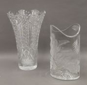 Two boxed Waterford crystal vases, Surfing Dolphins and Maritana. The latter 35 cm high.