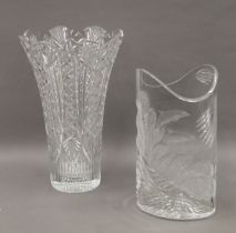 Two boxed Waterford crystal vases, Surfing Dolphins and Maritana. The latter 35 cm high.