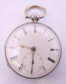 A J Metcalf of London open face silver cased pocket watch. 4.25 cm diameter.