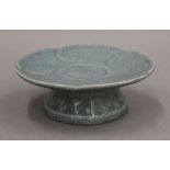 A Chinese Ru Ware style lotus pale blue crackle glazed footed dish,